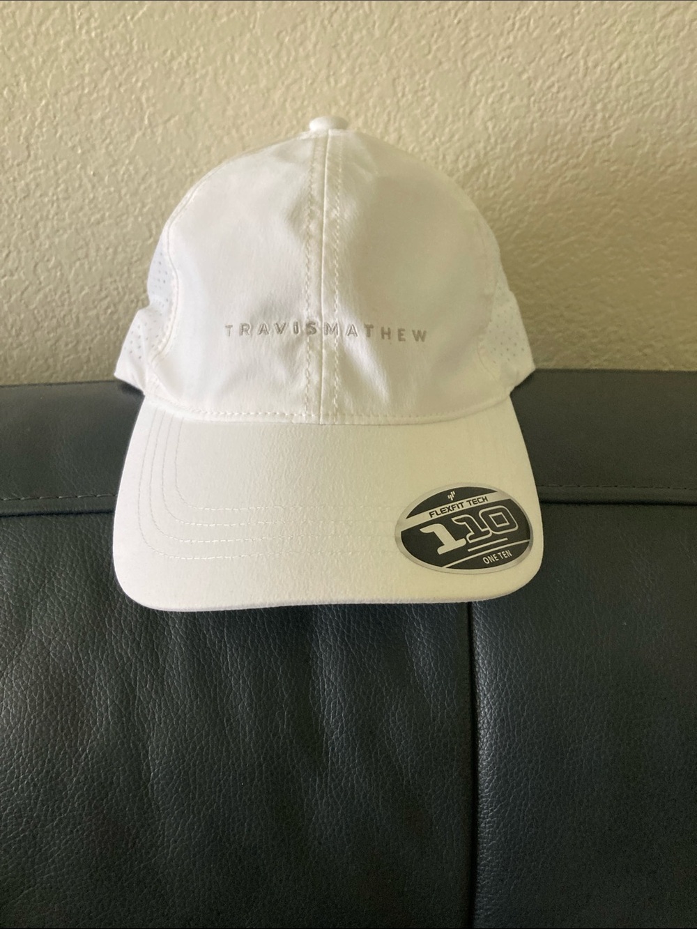 Travis Mathew White Performance Hat with Subtle Logo